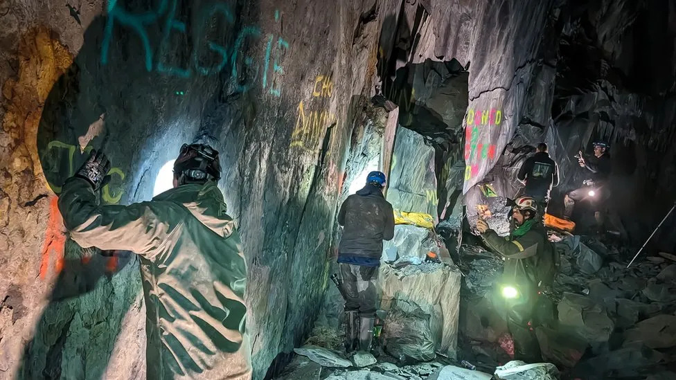 The cave walls are now covered in graffiti